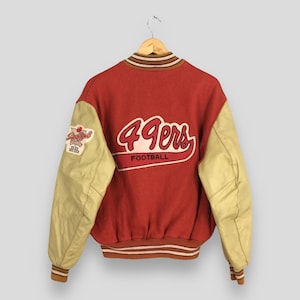 NFL サンフランシスコ 49ers レザージャケット San Francisco 49ers 5X Super Bowl Champion Skyline Vegan Leather Jacke