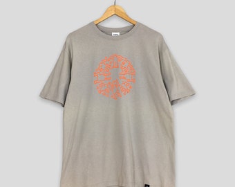 Camiseta vintage de los 90 con estampado de Keith Haring "Circle of Men Dance", talla XL. Estilo pop art de Keith Haring, estilo streetwear, grafiti. Camiseta gris talla XL.