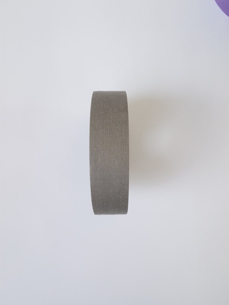 May include: A roll of grey duct tape.