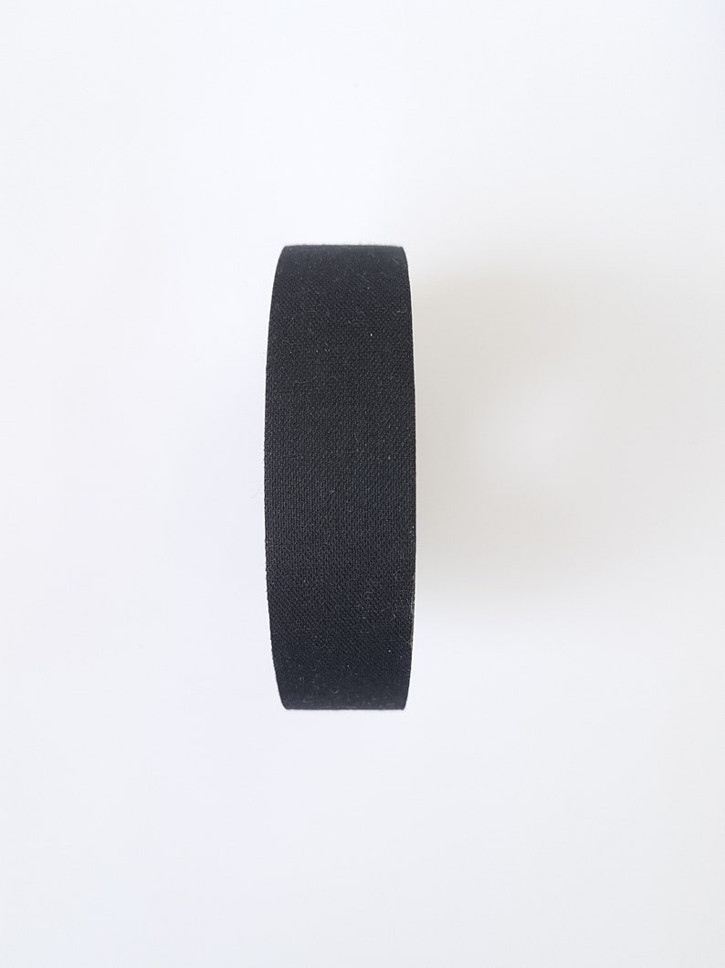 May include: A roll of black electrical tape.