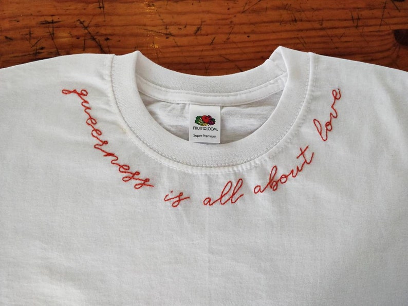 Queerness is all about love hand embroidered unisex t-shirt queer, love, self love, lgbt, embroidery image 3