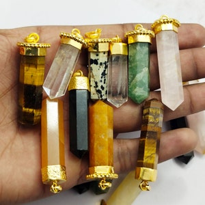 May include: Assortment of 10 gold-capped crystal point pendants. The pendants are made of various types of crystals, including clear quartz, tiger's eye, rose quartz, and black obsidian. Each pendant has a gold-plated bail for easy attachment to a necklace or bracelet.