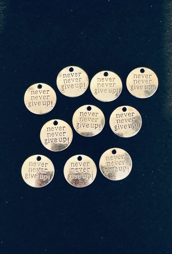 10 Piece “Never Give Up” Charms