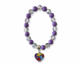 Pulsera elástica con dije de corazón para el autismo