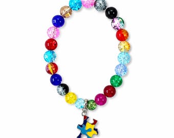 Pulsera elástica con dije de pieza de rompecabezas de autismo