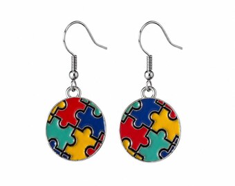 Pendientes colgantes circulares de esmalte para la concienciación sobre el autismo.