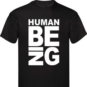 May include: Black t-shirt with white text that reads "HUMAN BEING" in a stylized font.