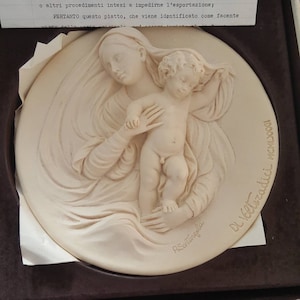 Dante di volteradici alabaster wall plaques. Intricate detail depicting maddonna and baby and lazarus. All boxed with certificate. VINTAGE