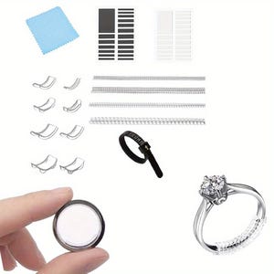 May include: A set of ring sizers for measuring finger size. The set includes a variety of sizes, a ring sizer tool, and a cleaning cloth. The ring sizer tool is black with white numbers. The cleaning cloth is light blue.