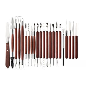 May include: A set of 24 pottery and sculpting tools. The tools have dark brown wooden handles and silver metal tips. The tools include various shapes such as blades, loops, and brushes, ideal for detailed work.