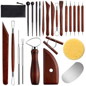 May include: A comprehensive set of pottery and clay sculpting tools including various wooden modeling sticks, metal wire loops, needle tools, a serrated scraper, a yellow circular sponge, a metal rib, and a black zippered storage pouch.