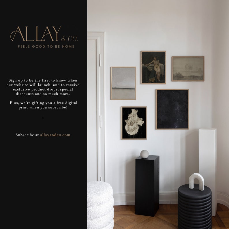 May include: A gallery wall featuring five framed art prints in various sizes and styles, including a landscape, a figure study, and abstract pieces. The display is arranged on a white wall above a black pedestal and a black ribbed cylindrical stool.