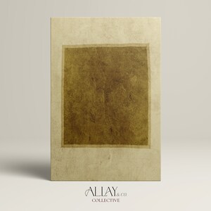 May include: A rectangular wall art piece featuring a textured, light beige background with a centered, dark brown square block. The surface has a mottled, paper-like appearance. Below the artwork, the text ALLAY & CO. COLLECTIVE is printed.