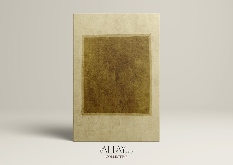 May include: A rectangular wall art piece featuring a textured, light beige background with a centered, dark brown square block. The surface has a mottled, paper-like appearance. Below the artwork, the text ALLAY & CO. COLLECTIVE is printed.
