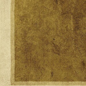 May include: A rectangular surface featuring a large, dark olive-brown central area with a textured, granular appearance. This dark section is framed by a lighter, off-white border that runs along the left and bottom edges of the composition.