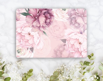 May include: A rectangular laptop skin featuring a watercolour illustration of large, blooming peonies in shades of dusty rose, soft pink, and deep mauve, accented with dark green leaves against a pale, solid light pink background.
