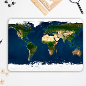 May include: A rectangular laptop skin featuring a high-resolution satellite view of the Earth. The design displays continents in shades of green and brown against a deep blue ocean, with a prominent white ice shelf visible along the bottom edge.