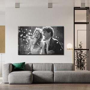 May include: A black and white rectangular canvas print featuring a laughing couple surrounded by falling petals. The image includes overlaid white text that reads: A love like yours is hard to find. When you find it, hold it tight. When you find it, keep it. When you need it, remember it. Every day. It is the gift of my life.