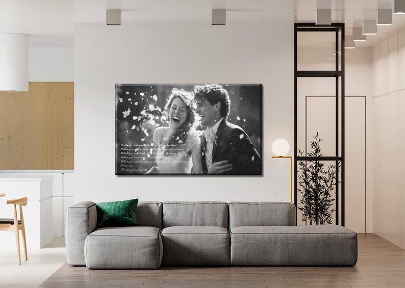 May include: A black and white rectangular canvas print featuring a laughing couple surrounded by falling petals. The image includes overlaid white text that reads: A love like yours is hard to find. When you find it, hold it tight. When you find it, keep it. When you need it, remember it. Every day. It is the gift of my life.