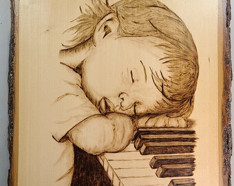 Piano Kid wood burning