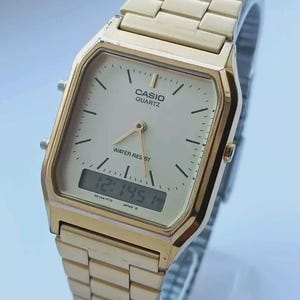 Watch Casio ANALOG /DIGITAL  Chronograph  Wrist watch Mens  Quartz Ref. 901A4-F79 Gold tone
