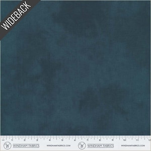 May include: A piece of wideback fabric in a deep teal color. The fabric has a subtle texture and a gradient effect, with darker areas creating depth. The word "WIDEBACK" is printed on a black diagonal banner in the upper left corner.