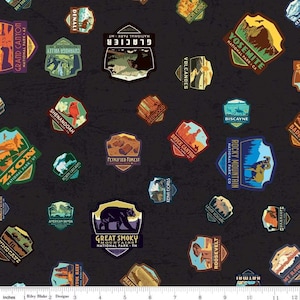 May include: Black fabric featuring a repeating pattern of colorful national park patches. Each patch showcases park names like Yosemite, Zion, and Glacier, with illustrations of mountains, bears, and landscapes. A decorative design.