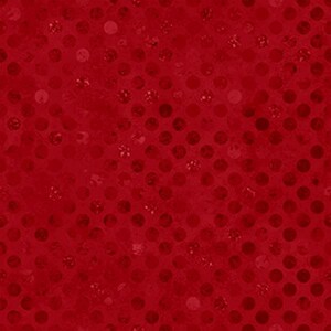 May include: A close-up of a red fabric with a pattern of small, evenly spaced, circular dots. The dots are a slightly darker shade of red than the background, creating a subtle contrast and texture.
