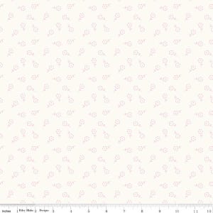 May include: Off-white fabric with a repeating pattern of small, pink floral designs. The flowers have a simple, dotted outline and are scattered across the surface. The fabric is measured in inches.