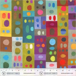 May include: Colorful fabric with a repeating pattern of rectangular blocks. Each block features a different color and shape, including circles and ovals. The color palette includes yellow, orange, purple, green, and blue. The fabric is 12 inches wide.