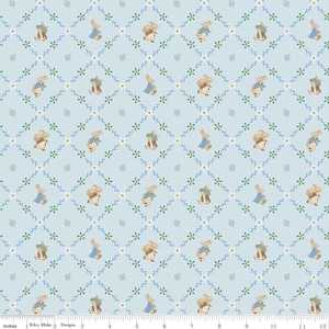 May include: Light blue fabric with a repeating pattern of bunnies in blue jackets and brown outfits, interspersed with white flowers and green vines. The design is arranged in a diamond grid.