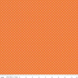 May include: Orange fabric with a white polka dot pattern. The fabric is a solid orange color with small white dots evenly spaced throughout.