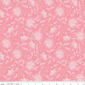 May include: Pink fabric with a repeating floral pattern. White outlines depict various flowers, leaves, and smaller floral accents. The design is evenly spaced across the fabric, creating a consistent and delicate aesthetic. The fabric is marked with a ruler in inches.