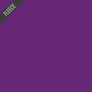 May include: Solid purple fleece fabric. The word "FLEECE" is printed in white on a diagonal black banner in the upper left corner. The fabric is a deep, rich shade of purple.