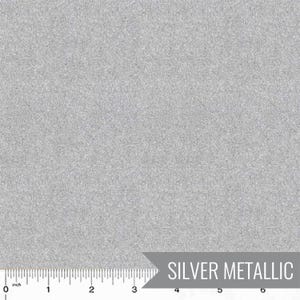 May include: A close-up of silver metallic fabric. The fabric has a textured, speckled appearance. A ruler is at the bottom of the image, with measurements in inches. The words "SILVER METALLIC" are in a gray banner in the lower right corner.