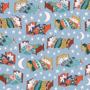 May include: A repeating pattern of cartoon beds with sleeping mice, each with a unique floral or geometric patterned blanket. The beds are set against a light blue background with white stars and crescent moons.