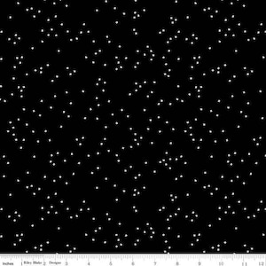 May include: Black fabric with a repeating pattern of small, white, square shapes. The squares are scattered across the surface, creating a speckled or starry effect. The fabric is likely cotton or a similar material.