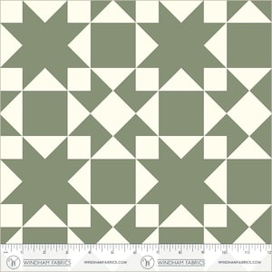 May include: A fabric with a repeating geometric pattern. The design features star-like shapes and squares in a sage green and cream color scheme. The fabric is measured in inches, with a ruler along the bottom.