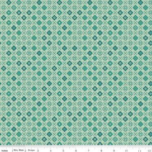 May include: A repeating pattern of teal and dark teal floral and cross designs on a light teal background. The fabric has a grid-like structure with small white dots. The text "Riley Blake Designs" is visible at the bottom.