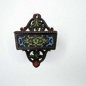 Antique cast iron match stick wall hanger