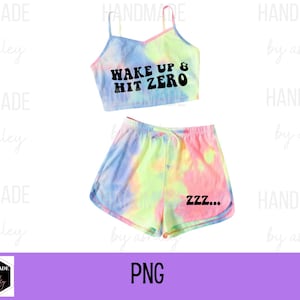 May include: A tie-dye crop top and matching shorts set. The top has the text "Wake Up & Hit Zero" in black. The shorts have the text "ZZZ..." in black.
