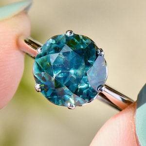 Late Deco Old European Cut Electric Teal Blue Zircon Platinum Solitaire Ring (6.60cts)