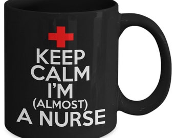Nurse Coffee Mug: Keep Calm (Almost) A Nurse - Black 11oz