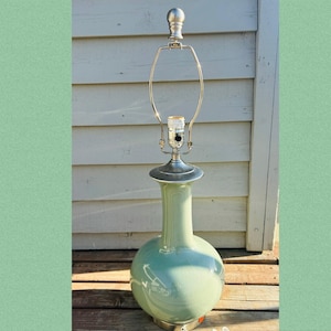 May include: A set of three ceramic mugs with a speckled, matte finish. The mugs are in shades of cream, light gray, and dark gray. Each mug has a simple, modern design and a rounded handle. Perfect for coffee or tea.