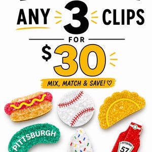 May include: A promotional image for hair clips. The image features various colorful clips shaped like a hot dog, baseball, taco, Pittsburgh, ice cream, and ketchup bottle. Text includes "BUNDLE DEAL" and "ANY 3 CLIPS FOR $30".