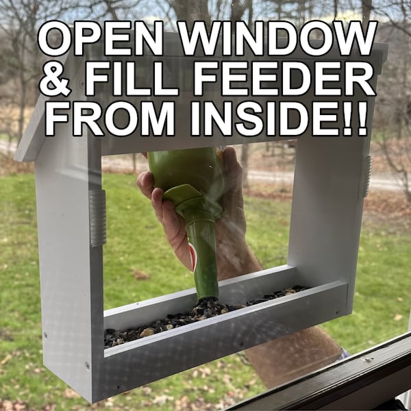 Window Bird Feeder can be filled from inside or outside is made from beautiful PVC lumber, A portion of proceeds is sent to a bird sanctuary