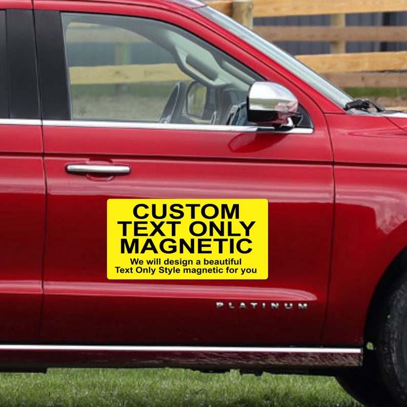 May include: A yellow custom text only magnetic sign on a red car. The sign says "CUSTOM TEXT ONLY MAGNETIC. We will design a beautiful Text Only Style magnetic for you."