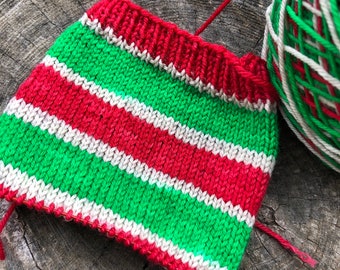 Hand dyed self striping red and green sock yarn