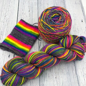 Hand dyed self striping grey, fluorescent rainbow sock yarn image 2