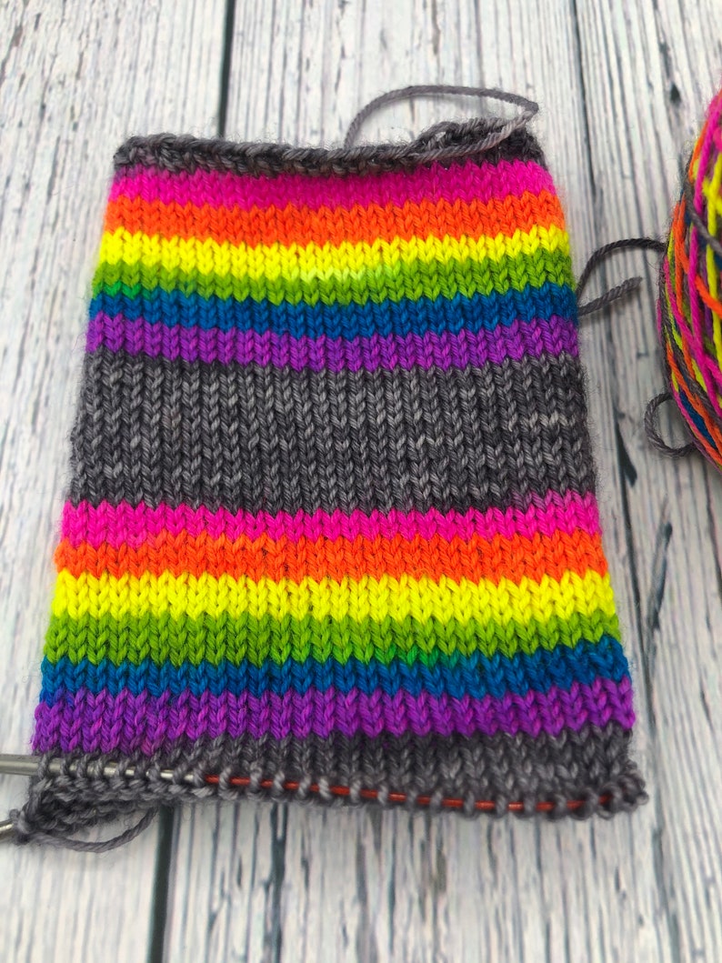 Hand dyed self striping grey, fluorescent rainbow sock yarn image 6